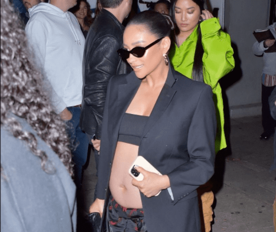Rihanna pregnant and bare stomach