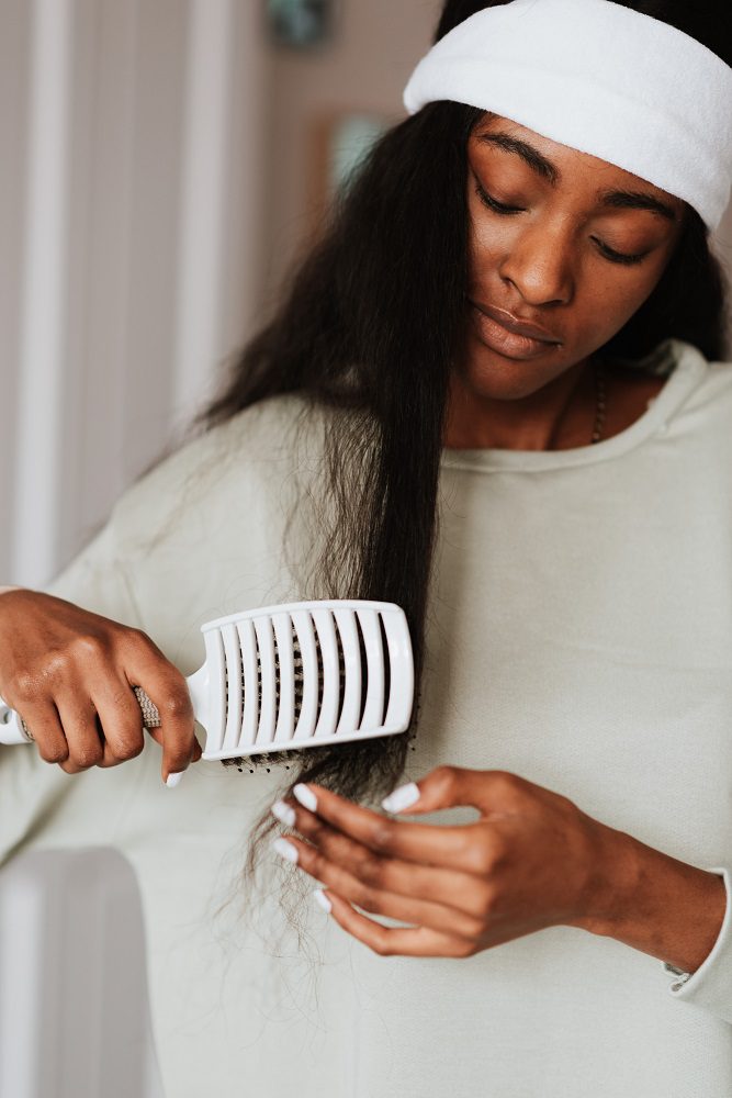 Split ends can be tackled without cutting.  Playback/Pexels/Anete Lusina