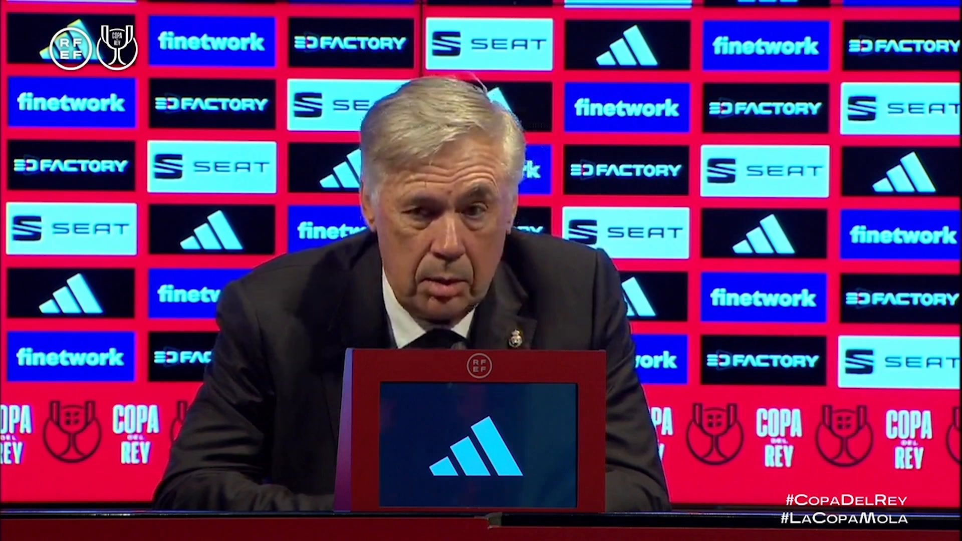 Ancelotti giving a press conference