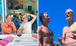 Marcos Caruso steps on his husband's butt on vacation in