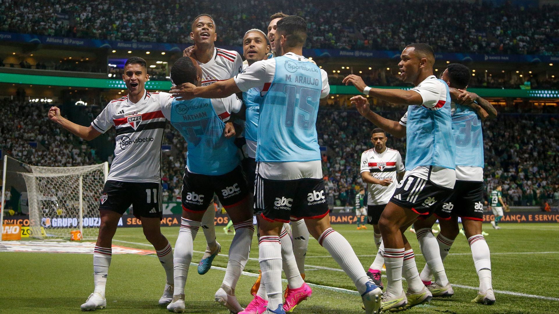 São Paulo players celebrate a goal against Palmeiras