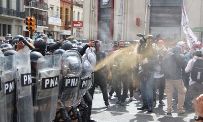 Protesters clash with police as they try to enter Buenos