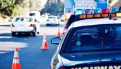 A closed lane and a parked police car