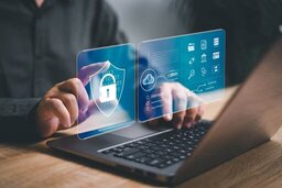 Translucent padlock icon between a notebook and a person, who is selecting it with his finger